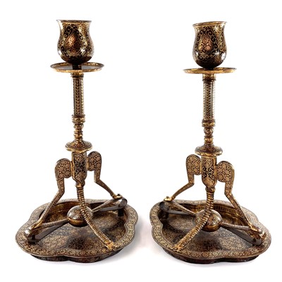 Lot 1010 - A pair of Persian gold damascened metal...