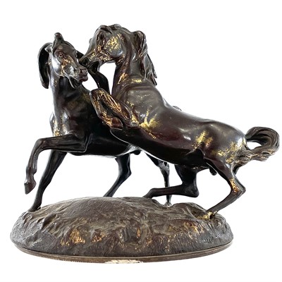 Lot 98 - A French gilt metal figure group of two horses,...