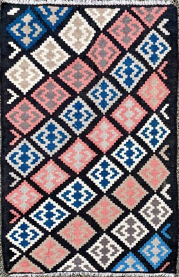 Lot 1243 - A Persian kelim, 20th century, the charcoal...