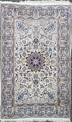 Lot 1249 - A Persian rug, 20th century, the ivory field...