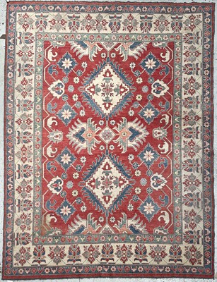 Lot 1253 - A Chobi Zeigler design carpet, the madder...