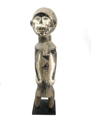 Lot 132 - A Songye type power figure painted in white...