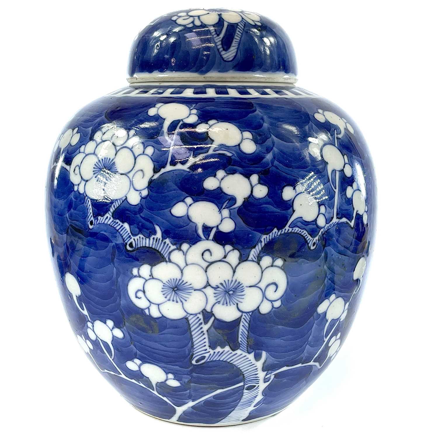 Lot 9 - A Chinese blue and white porcelain prunus...
