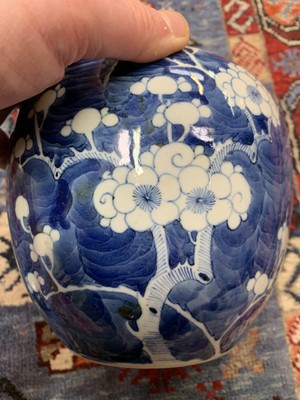 Lot 9 - A Chinese blue and white porcelain prunus...