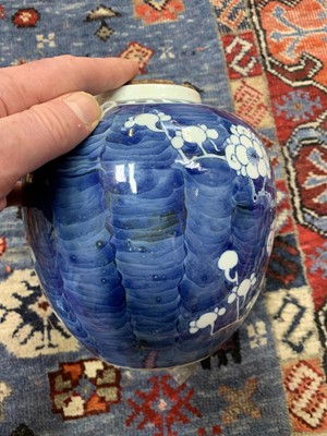Lot 9 - A Chinese blue and white porcelain prunus...