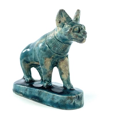 Lot 1026 - An Egyptian glazed faience pottery model of a...