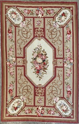 Lot 1254 - An Aubusson style rug, the octagonal central...