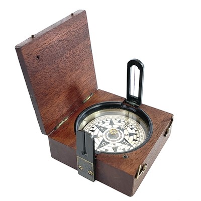 Lot 157 - A 19th century travel compass with a printed...