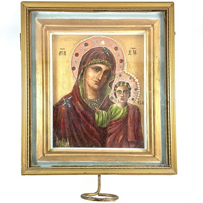 Lot 43 - A Russian icon, painted with the Mother of God,...