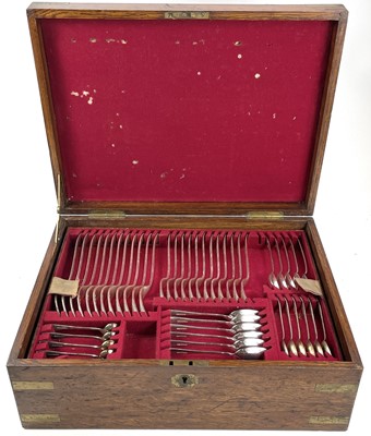 Lot 70 - A Victorian brass bound oak cased canteen of...