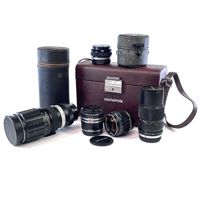 Lot 72 - Three Olympus OM-system lenses, a G.Zuiko auto-...