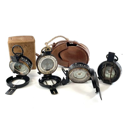 Lot 109 - A WWII brass lacquer compass by T.G Co Ltd...