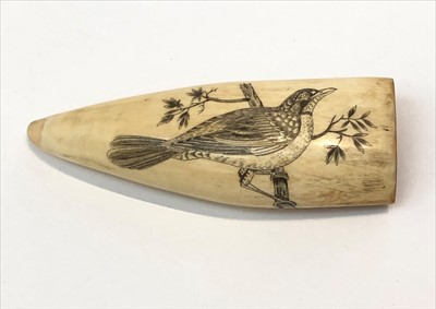 Lot 479 - A 19th century scrimshaw whale tooth,...