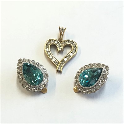 Lot 2689 - A pair of 9ct gold pear shaped blue stone clip...