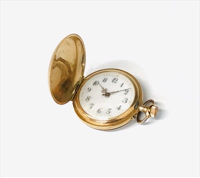 Lot 2690 - A 14ct gold small full hunter cased keyless...