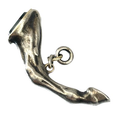 Lot 25 - A silver seal fob and pipe tamper in the form of a horses leg.