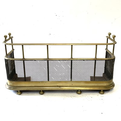 Lot 26 - A George III brass fender.