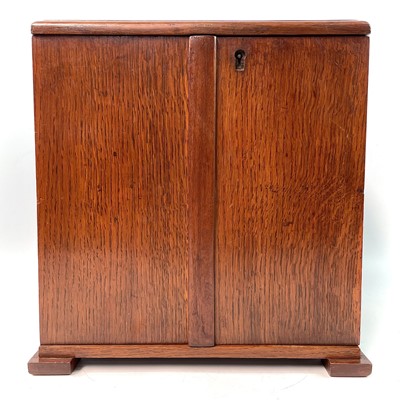 Lot 38 - An oak table cabinet, early 20th century.
