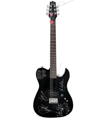 Lot 45 - A SIGNED 'STATUS QUO' GUITAR.