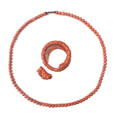 Lot 230 - A 19th century articulated coral bracelet carved as a mermaid.