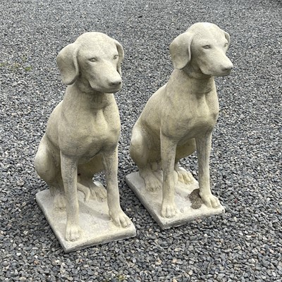 Lot 610 - A pair of reconstituted church stone models of...