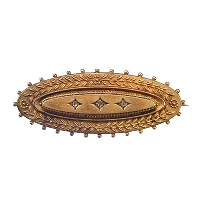 Lot 107 - A 15ct Victorian three small old cut diamond set oval mourning brooch with locket back.