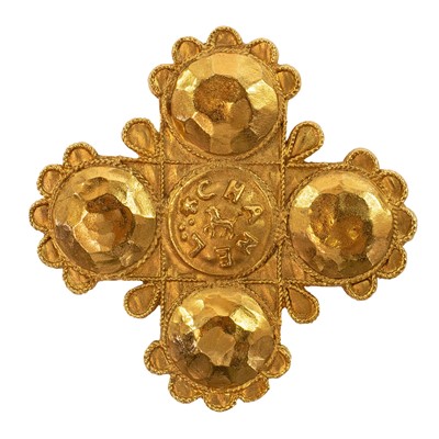 Lot 399 - Chanel gold plated brooch. Cross and Lion design.
