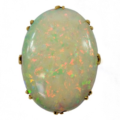 Lot 105 - An 18ct gold white opal set ring.