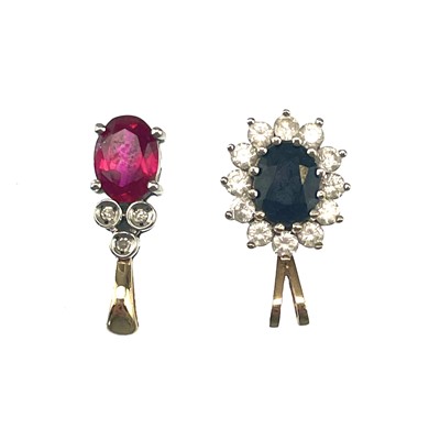 Lot 81 - Two 9ct stone set pendants.