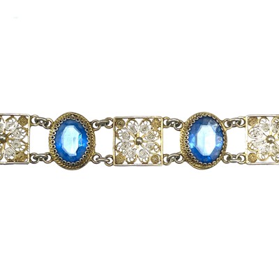 Lot 210 - An 800 silver gilt blue stone set bracelet
