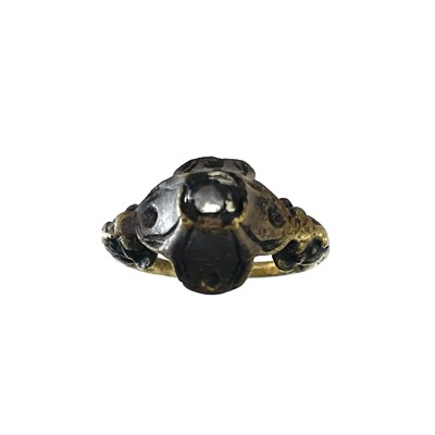 Lot 181 - An interesting, probably 16th century, bronze white stone set ring, size L, 5.3g.
