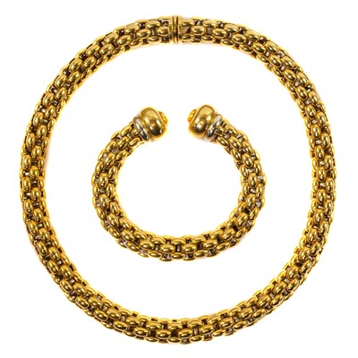 Lot 405 - Fope Vendome – bi-colour gold necklace and matching bangle.