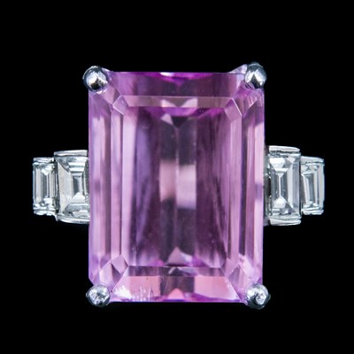 Lot 99 - An 18ct white gold kunzite and diamond dress ring.