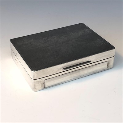 Lot 2070 - An engine turned silver cigarette box by...