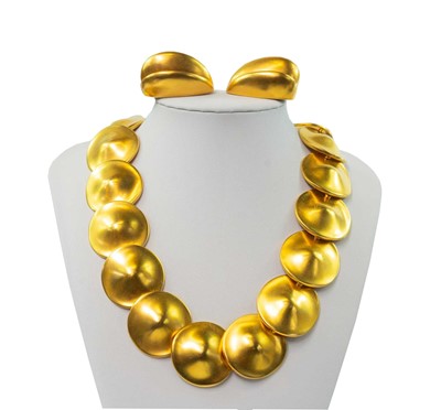 Lot 281 - Robert Lee Morris gold plated clip earrings with similar disc link design necklace.