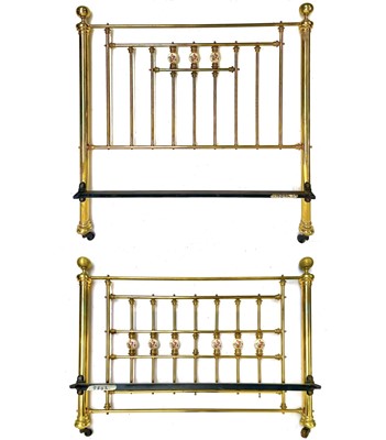 Lot 1932 - A Victorian style brass bed head and end.