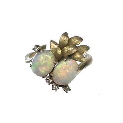 Lot 97 - A 14ct gold opal and diamond set six stone ring.
