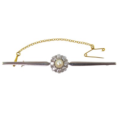 Lot 83 - A gold and platinum diamond and pearl cluster set bar brooch.