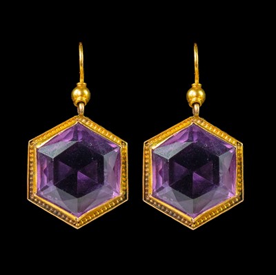 Lot 53 - A pair of Victorian yellow metal mounted hexagonal cut amethyst earrings.