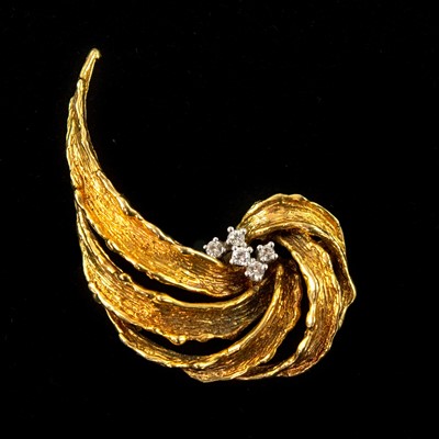Lot 74 - A 1960's 9ct gold diamond set five stone brooch.