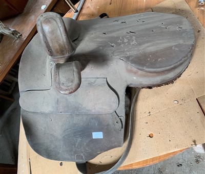 Lot 79 - A leather side saddle.