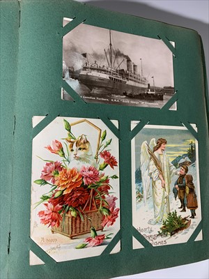 Lot 556 - Postcards. Album containing collection of...