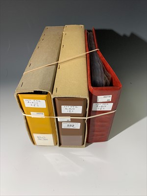 Lot 552 - Cigarette cards in three albums. 21 sets in...