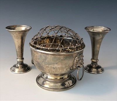 Lot 2048 - A silver rose bowl and spreader with twin lion'...