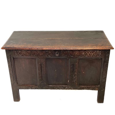 Lot 15 - A carved oak coffer, 17th century.