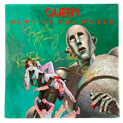 Lot 4 - SIGNED QUEEN 12". 'News of the World.