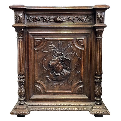 Lot 37 - A Victorian carved oak side cabinet.