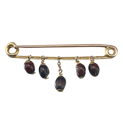 Lot 199 - An Edwardian 9ct pin brooch