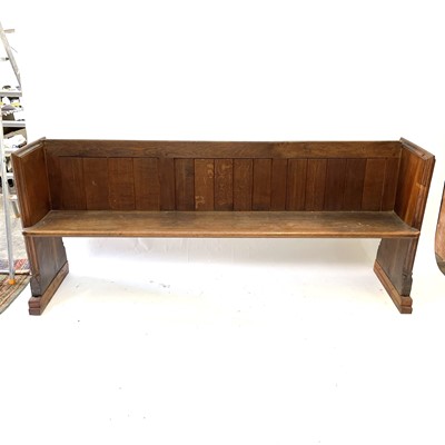 Lot 49 - A Gothic oak church pew, 19th century.