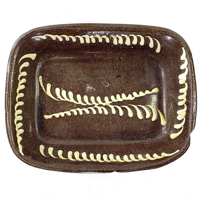 Lot 68 - A Slipware baking dish, mid 19th century.